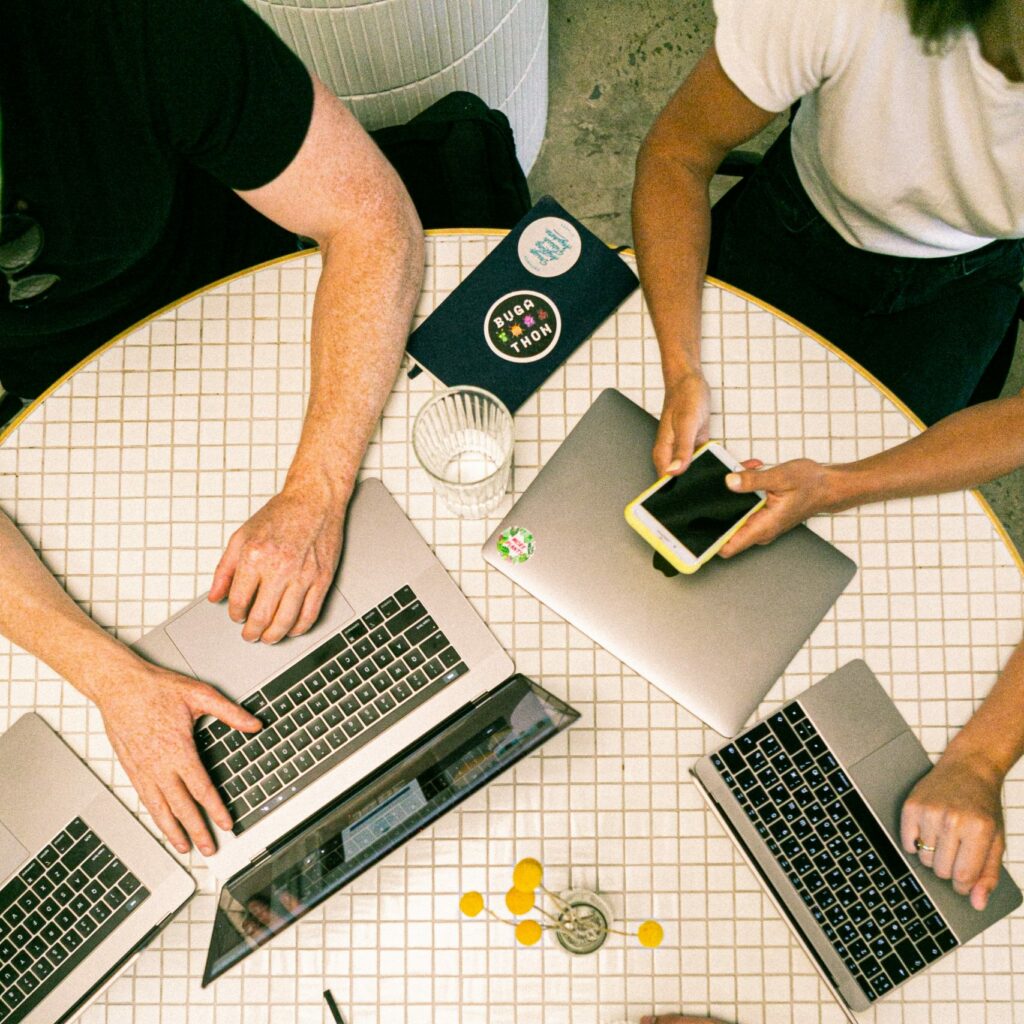 laptop and various devices on the table
